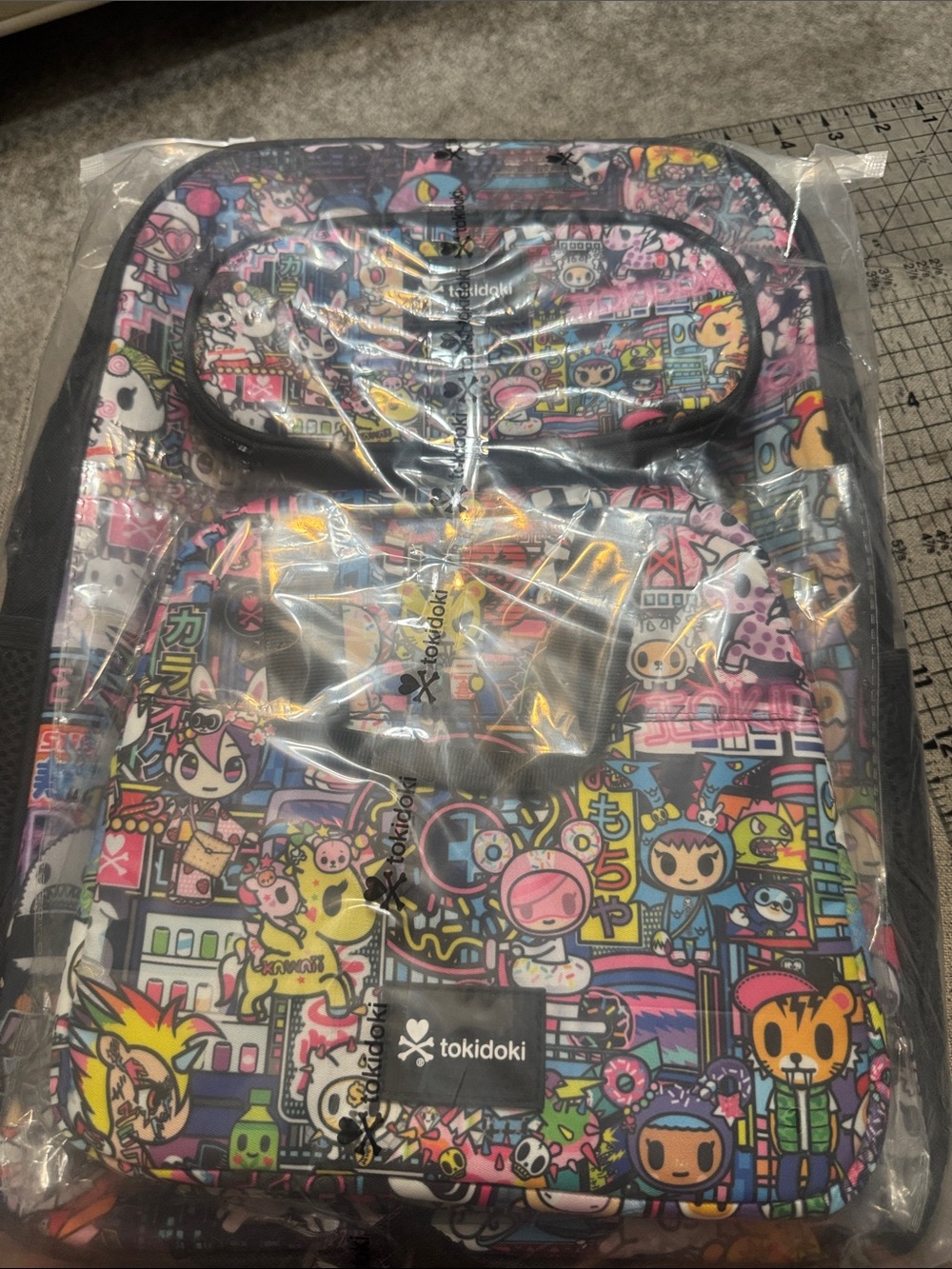 tokidoki Multicolor Neon Character Print Backpack, lunch pail and pencil pouch